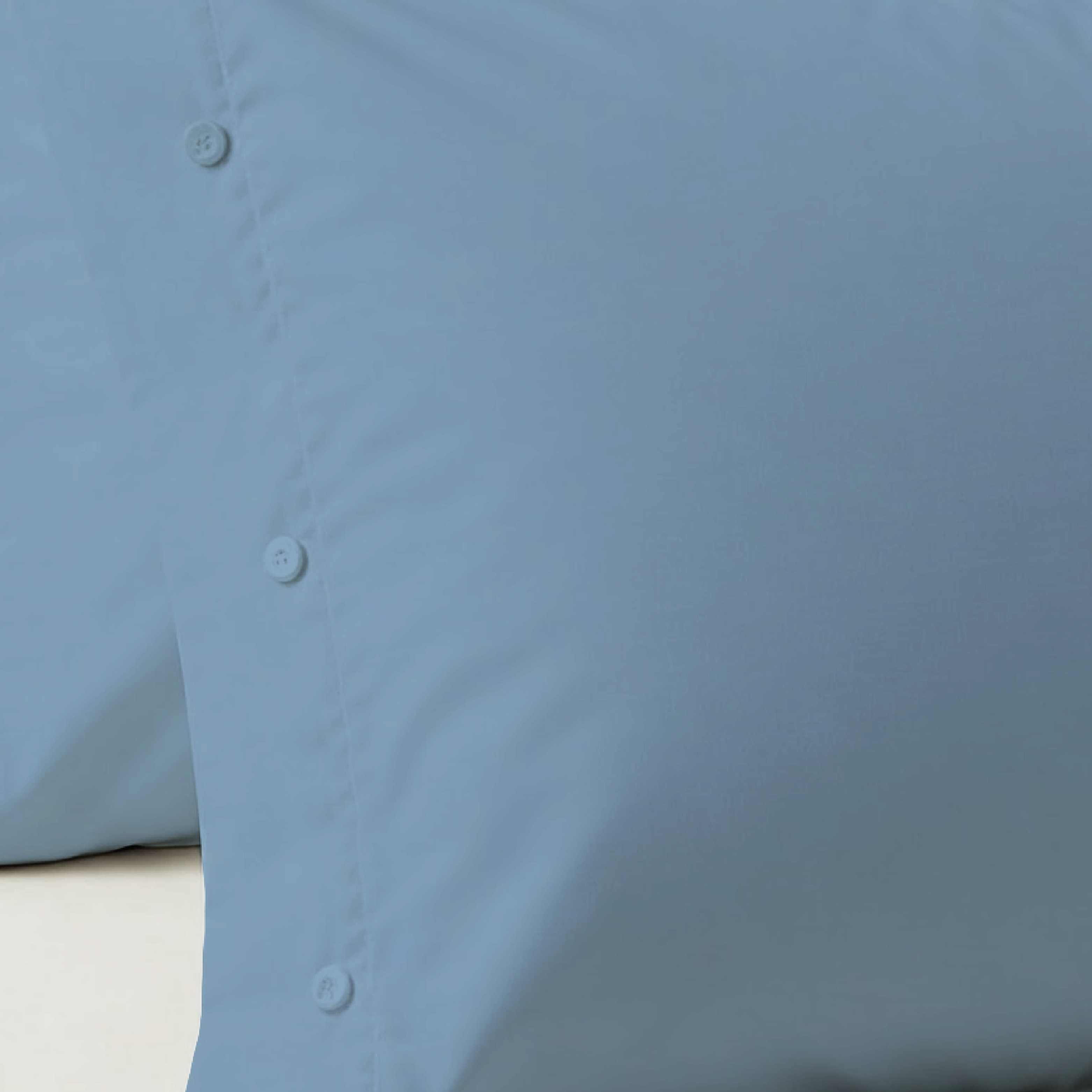 Coppia di federe in cotone con bottoni — in varie colorazioni