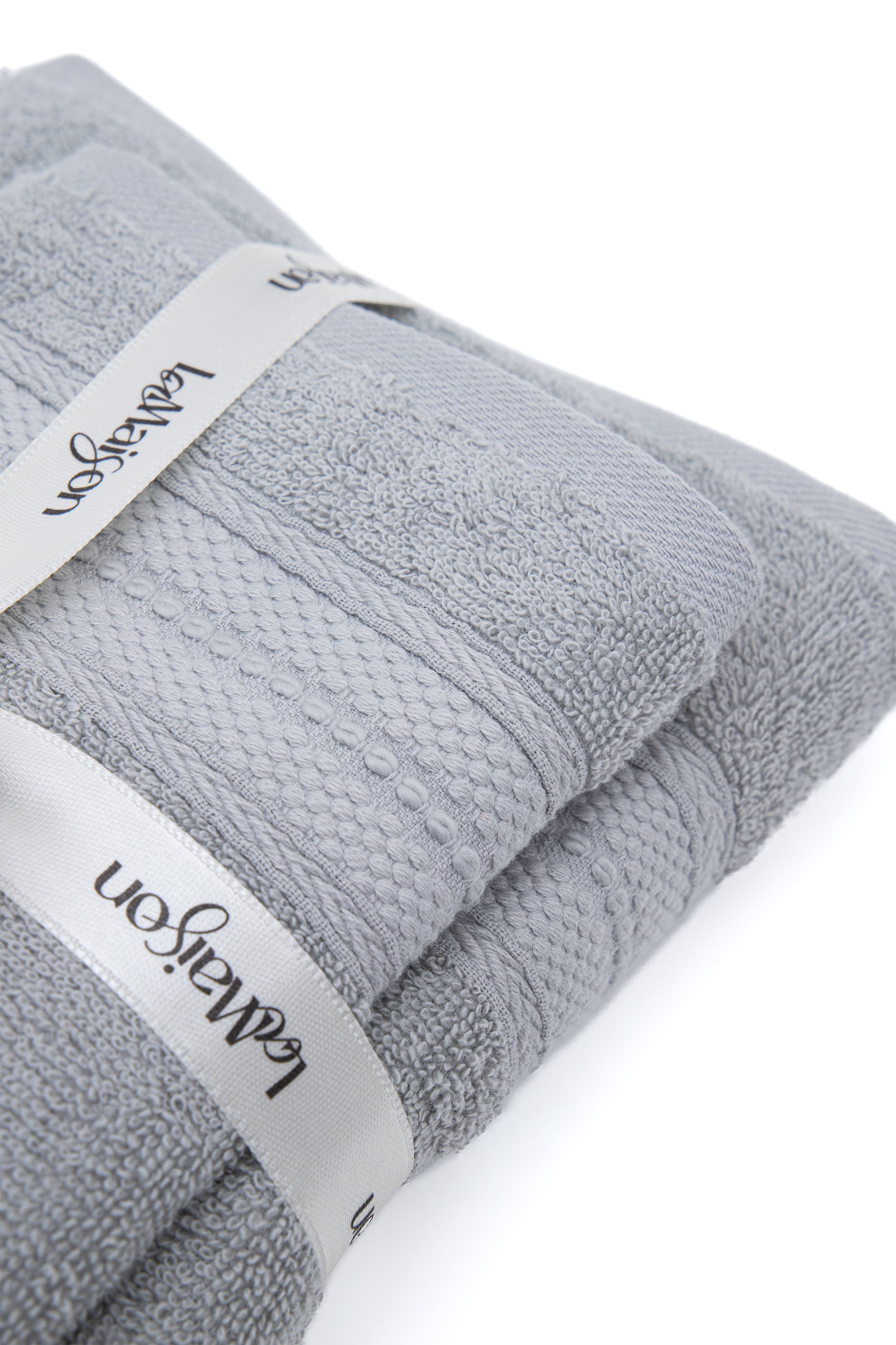 Asciugamano con ospite Grigio in cotone 550gsm | In vari disegni